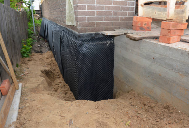 Happy homeowners after waterproofing job in Leonardo